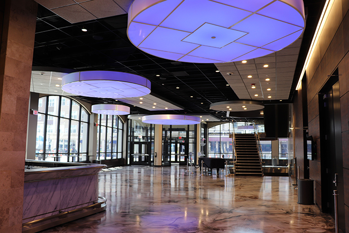 Lumetta was chosen to elegantly illuminate the lobby of the Carteret Performing Arts Center with their dramatic Custom Drum Pendants.
